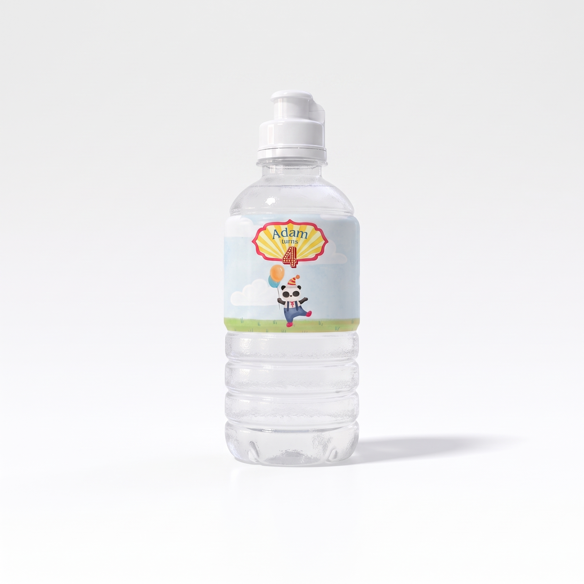 A clear plastic water bottle with a white flip-top cap, featuring a colorful custom label with a cartoon dog and the name 'Adam' on a light gray background.